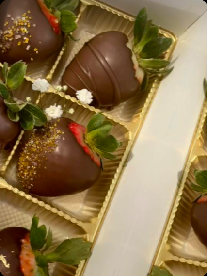 Gourmet chocolate covered strawberries with gold sprinkles