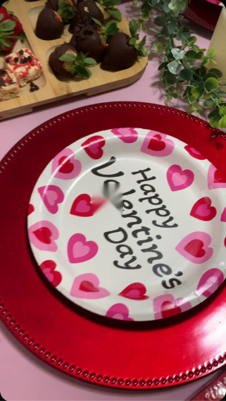 Valentine's Day dessert table styling with chocolate strawberries and sweets